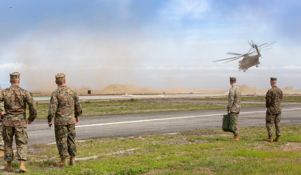 Midair fire forces Marine CH-53E to land