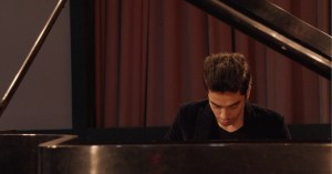 Rising young Afghan pianist wants world to see a different side of his country