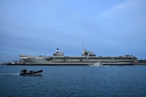 A British aircraft carrier departs Singapore amid tensions in the Pacific