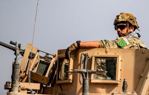 Silent protest? Withdrawing US soldier seen wearing previously banned Kurdish militia patch