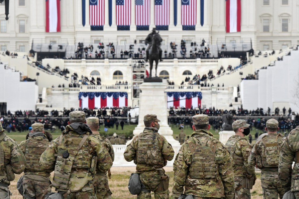 Guard waited more than three hours for approval to respond to Capitol riots, official says