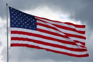 Who benefits from the use of kompromat in American politics?