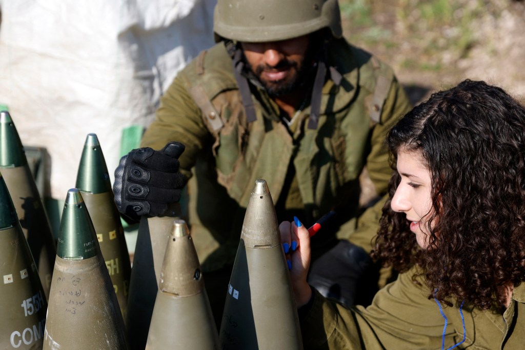 Israel strikes inside Lebanon, killing 2, after Hezbollah downs drone