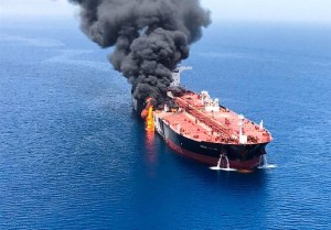 Why would Iran attack two tankers near the Strait of Hormuz?