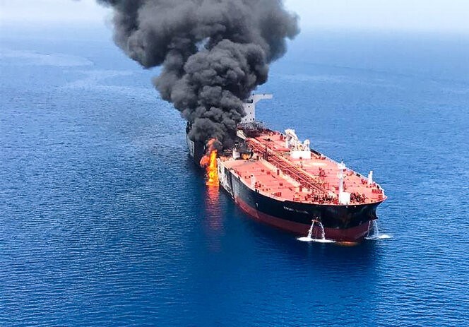 Why would Iran attack two tankers near the Strait of Hormuz?