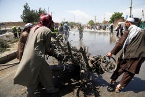 4 Afghan civilians killed, 4 US troops slightly wounded  in Kabul suicide attack on US convoy