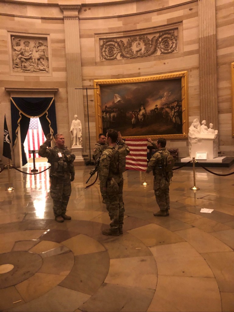 National Guard soldier reenlisted in Capitol amid pomp, tumult of Biden inauguration