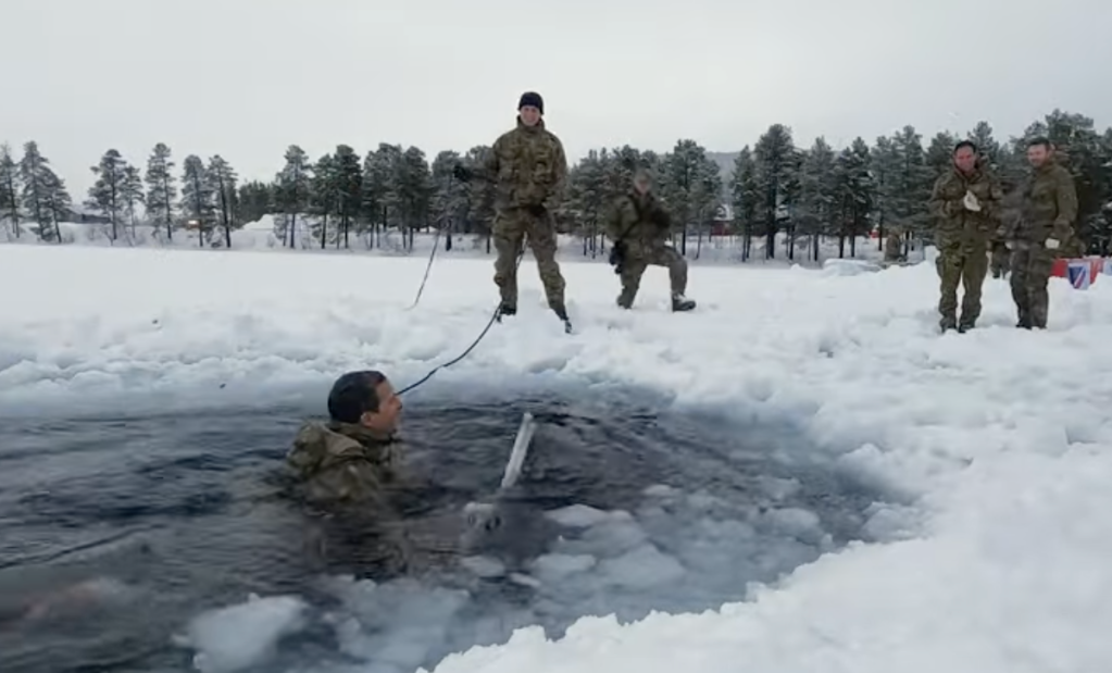 Bear Grylls freezes with Royal Marines in Arctic plunge