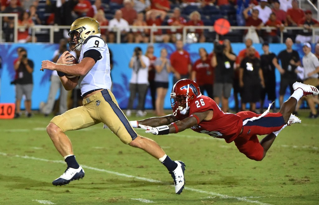 Navy tops FAU 42-19