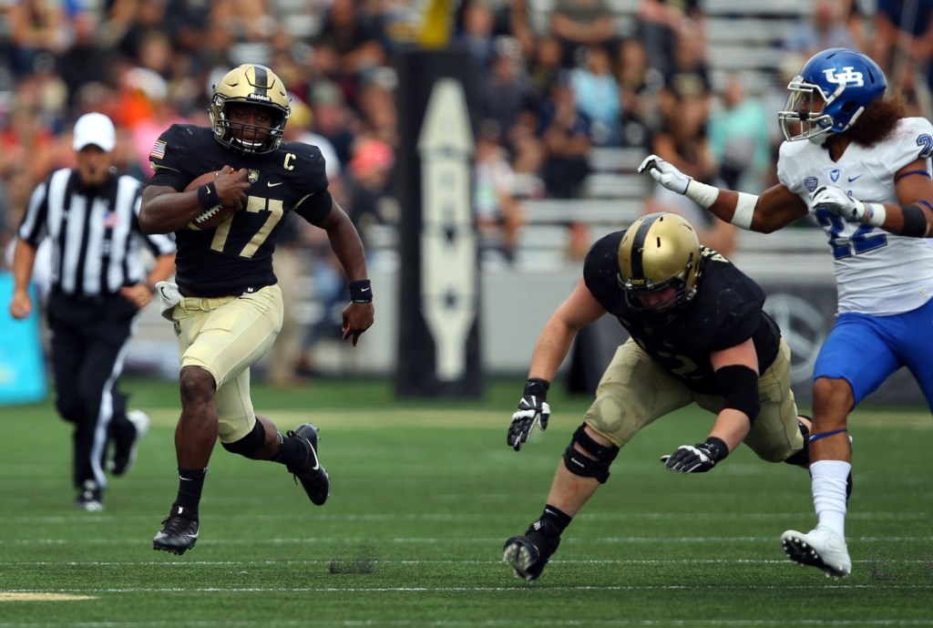 Woolfolk scores 2 TDs in 4th, Army beats Buffalo 21-17