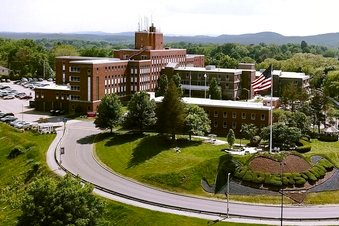 2 former leaders charged for handling of virus outbreak at veterans home