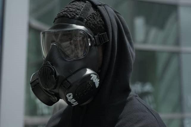 Security forces airman accused of trying to burn cop car during protests while wearing Air Force gas mask