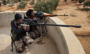 US-backed Kurdish fighters follow in footsteps of WWII Marine Raiders with homemade sniper rifle