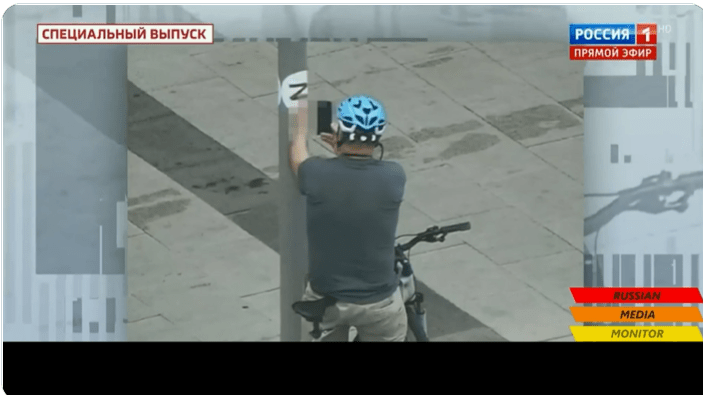 Video purportedly shows U.S. naval attaché flicking off a Russian military “Z”