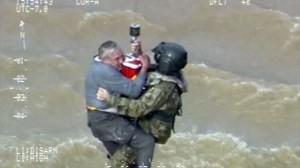 Watch a California Guard Black Hawk crew rescue a man from flood waters