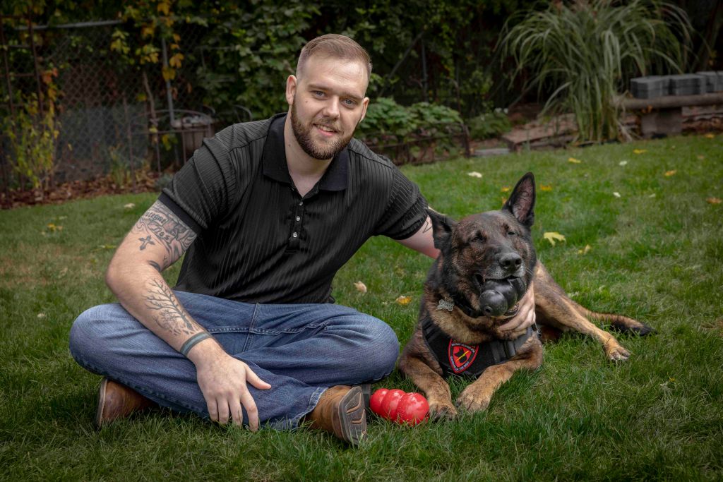 Army dog handler reunites with bomb-sniffing  buddy after years apart