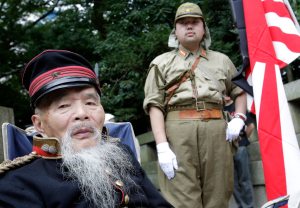 Japan’s Abe avoids controversial shrine as he marks World War II’s end