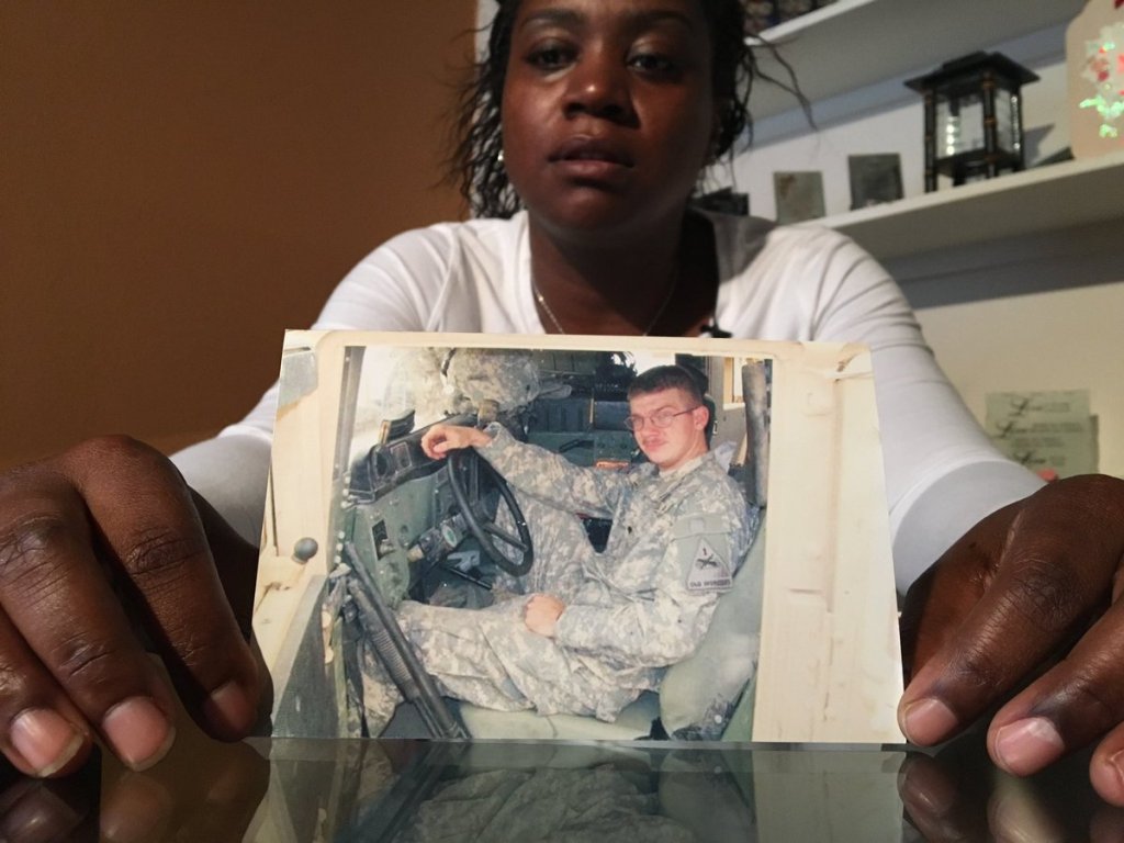 Military mother looking to reunite lost photo of soldier with his family