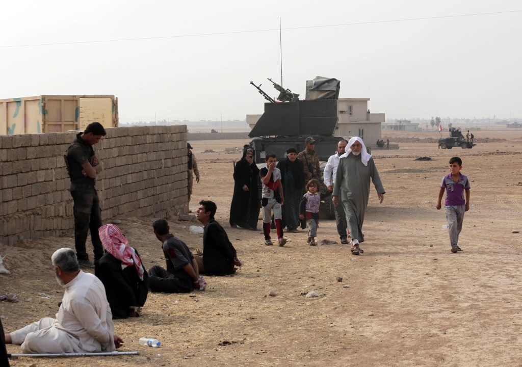 ISIS driving hundreds into Mosul, using them as human shields