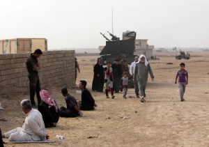 ISIS driving hundreds into Mosul, using them as human shields