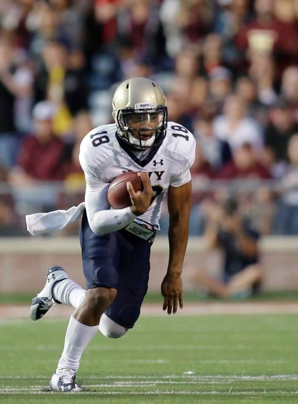 Smith leads Navy past Texas State 35-21 in first career start