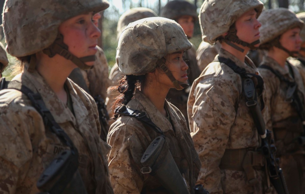 Recruits with first partially gender-integrated Marine boot camp company earn the title Marine