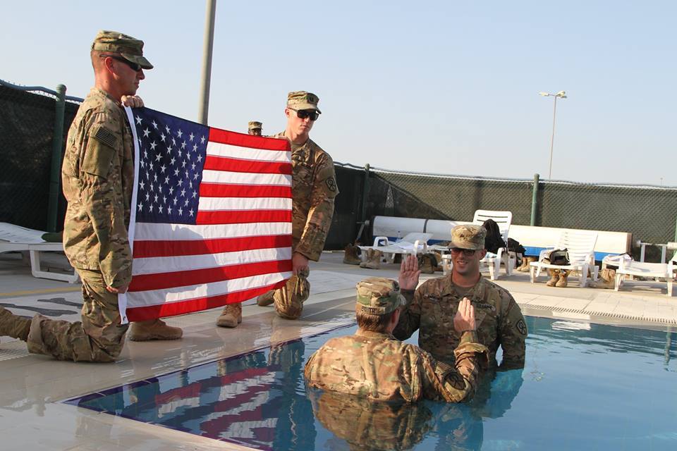 Taking the plunge: Reservist re-enlists in Camp Arifjan pool