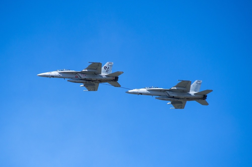 Navy jet damaged in mid-air refueling mishap
