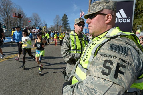 Troops guard, run the Boston Marathon