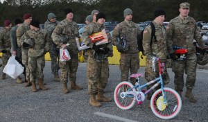 Soldiers earn foreign jump wings, donate toys in Army’s Operation Toy Drop