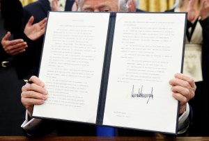 Trump sets 5-year, lifetime lobbying bans for officials