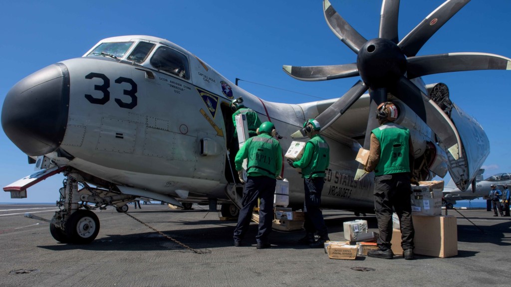 Eight personnel recovered from C-2A aircraft crash