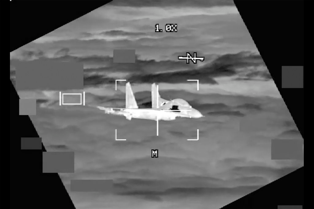 Watch Chinese fighter jet get within 10 feet of U.S. bomber in-flight