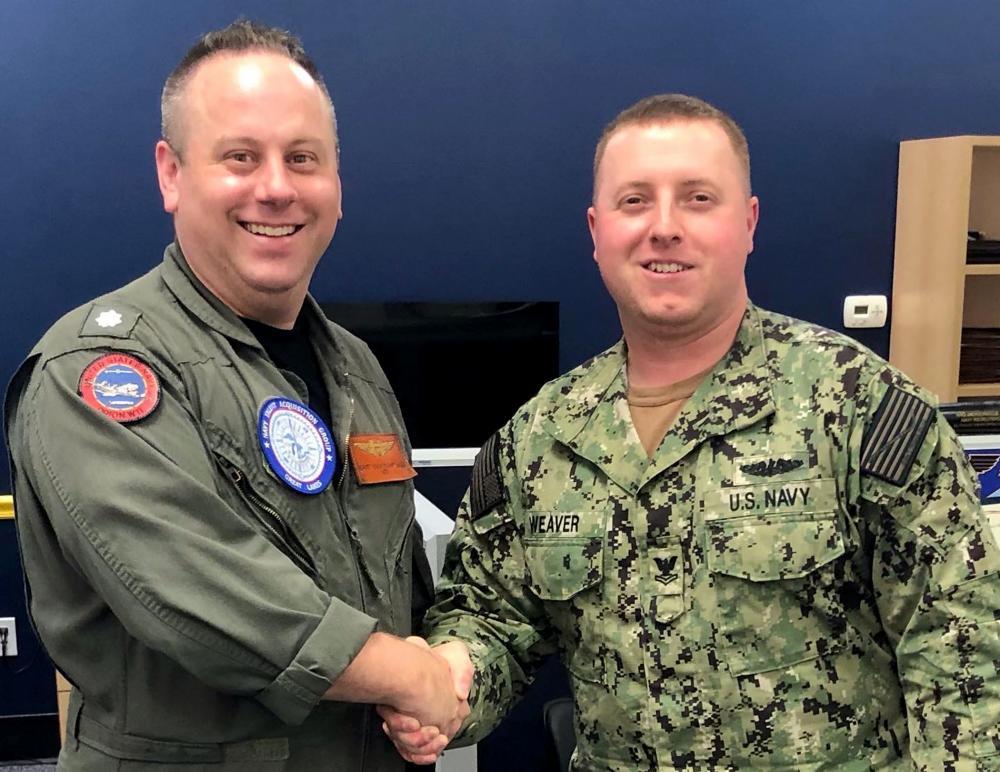 Bravo Zulu to this petty officer who rescued a mom and her kids from their submerged car
